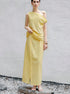 Yellow two piece skirt set with one shoulder sleeveless top and midi skirt
