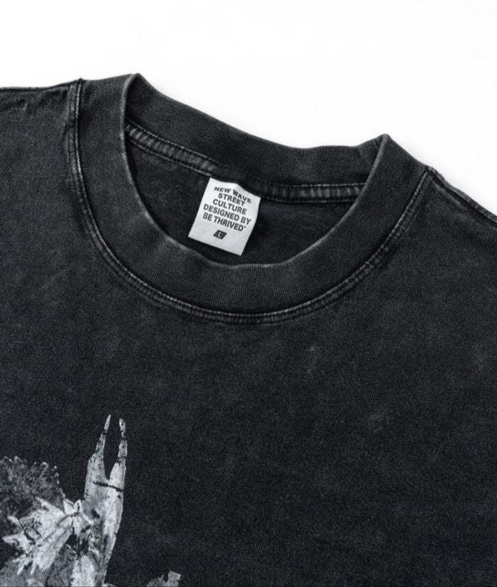 Close-up of black Yesskary tee neckline with visible tag.