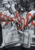 Fabric close-up showing texture and twisted graphic print on black tee.