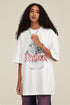 Close-up of female model in white Yesskary tee with necklace.