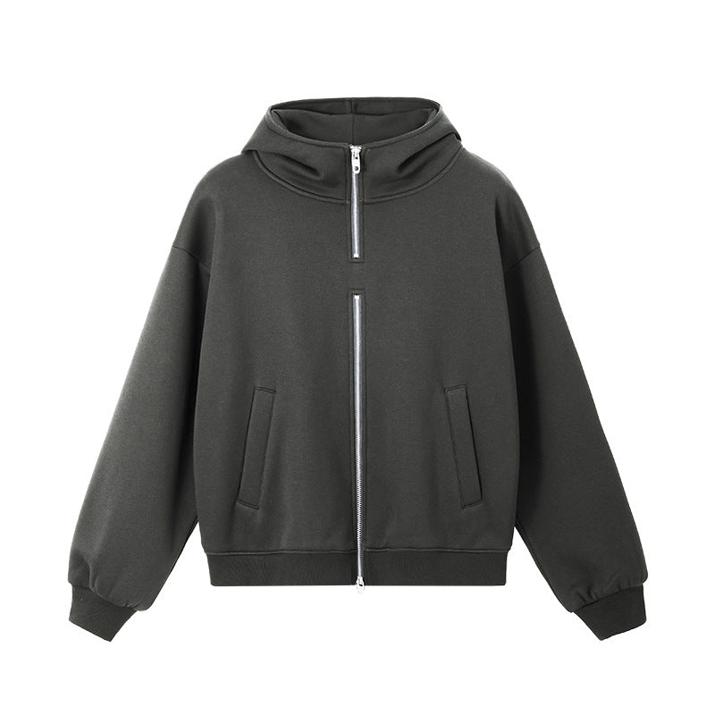 Oversized double-zip hoodie front view in black with kangaroo pockets